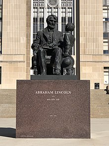 A statue of Abraham Lincoln and his son Tad is on the south side of City Hall. Abraham Lincoln Kansas City City Hall Statue.jpg