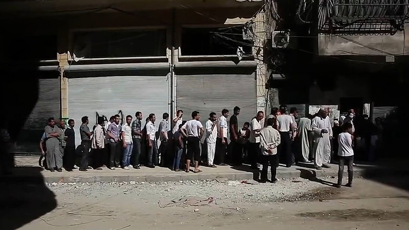 File:Aleppians waiting in a bread line during the Syrian civil war.jpg