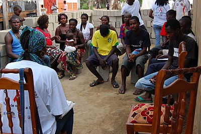 An HIV/AIDS educational outreach session in Angola Angolan community members at HIV AIDS outreach event (5686747785).jpg