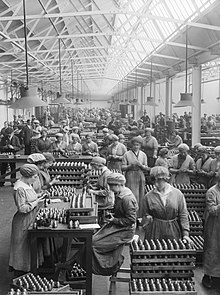 Female workers arranging and packing fuse heads in the Coventry Ordnance Works Arms Production in Britain in the First World War Q30151.jpg