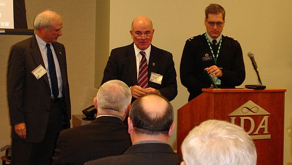 Secretary of the Army Dr. Francis J. Harvey (center), a former ASB member, awards the Decoration for Distinguished Civilian Service to departing ASB C