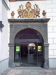 The lavish gate of the Beniczky House, owned by the Hungarian noble Beniczky family,[28] (in Slovak Benický[29]) on SNP Square displays a coat of arms of one of the aristocratic families from Banská Bystrica