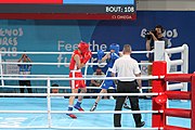 Deutsch: Boxen bei den Olympischen Jugendspielen 2018 Tag 12, 18. Oktober 2018 - Finale Leichtgewicht Mädchen – Oriana Saputo (Argentinien, blau) schlägt Emma Lawson (Australien, rot) 5-0; Ringrichter ist José Romero (Spanien). English: Boxing at the 2018 Summer Youth Olympics on 18 October 2018 – Girls' lightweight Bronze Medal Bout – Oriana Saputo (Argentina, blue) wins over Emma Lawson (Australie, red) 5-0; Referee is José Romero (Spain). Español: Boxeo en los Juegos Olímpicos Juveniles de Verano de 2018 en 18 de octubre de 2018 - Combate de medalla de bronce de las niñas: Oriana Saputo (Argentina, azul) gana a Emma Lawson (Australie, roja) 5-0; Árbitro es José Romero (España).