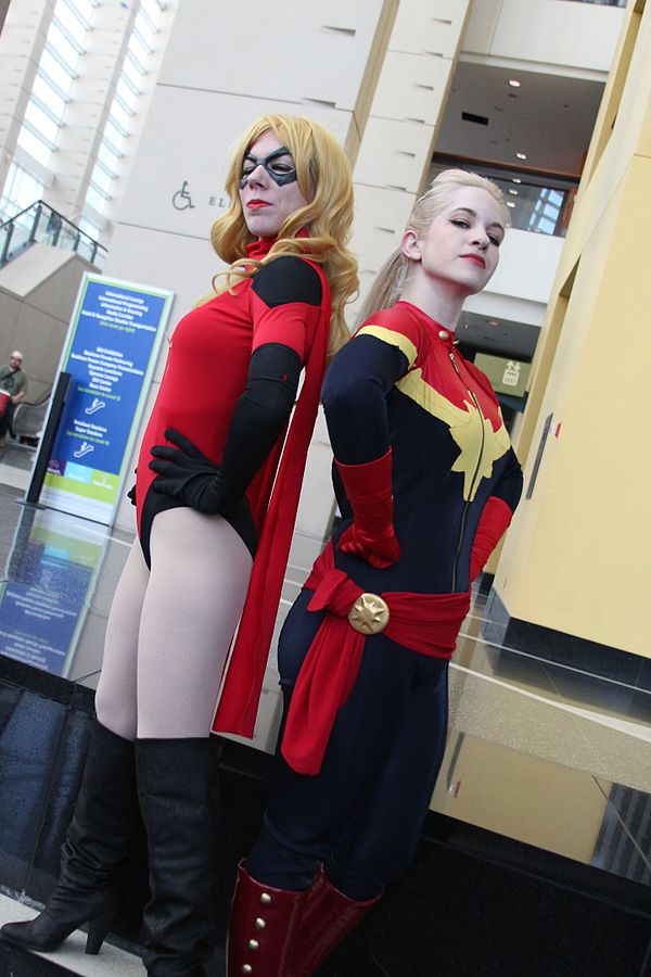 Cosplayers dressed as Ms. Marvel and Captain Marvel