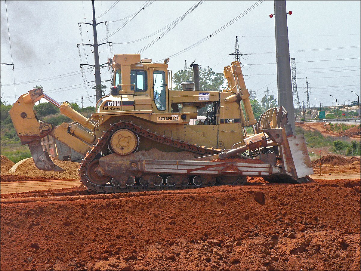 Бульдозер Caterpillar d10. Caterpillar d10n. Caterpillar ten. Bulldozer Caterpillar d9 Armored сносит здание. Красноярске работа бульдозер