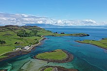 This is an aerial view of the islands of Canna, which was a hub for piracy in the 15th century. Canna (Canaigh) Aerial.jpg