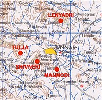 Location of Buddhist caves, including Shivneri caves, around the city of Junnar.