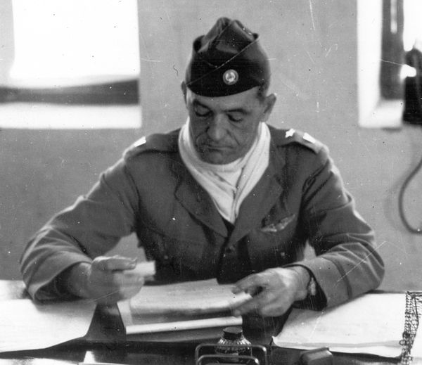 Chennault in his Kunming office, May 1942. He wears a US Army brigadier general's star on his left shoulder but Chinese insignia otherwise.