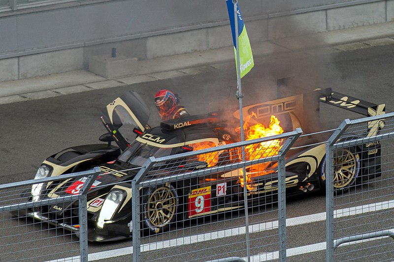 File:Christophe Bouchut escaping from burning Lotus 2014 WEC Fuji.jpg