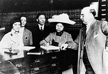 Clara Elizabeth Chan Lee, the first Chinese American woman to register to vote in the United States Clara Elizabeth Chan Lee voting in 1911.jpg