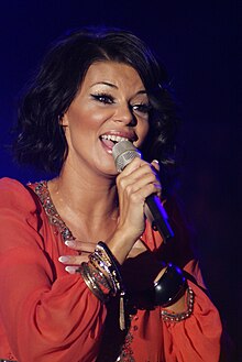 Edyta Gorniak (pictured in 2009), the first artist to represent Poland in Eurovision, finished in second place, Poland's highest position to date. Edyta Gorniak in 2009.jpg