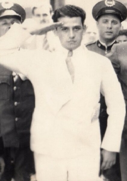 Elias Beauchamp gives a cadet military salute, moments before being summarily executed at police headquarters