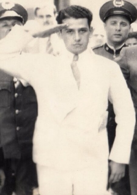 Elias Beauchamp gives a cadet military salute, moments before being summarily executed at police headquarters