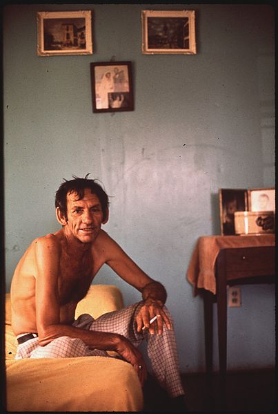 File:FISHERMAN RELAXES IN HIS HOME AT BAYOU GAUCHE - NARA - 544232.jpg