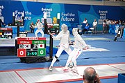 Deutsch: Fechten bei den Olympischen Jugend-Sommerspielen 2018: Tag 1, 7. Oktober 2018, Jungen, Säbel, Viertelfinale - Hibiki Kato (JPN) - Hyun Jun (KOR) 12:15 English: Fencing at the 2018 Summer Youth Olympics at 7 October 2018 – Boys' sabre Quarterfinals – Hibiki Kato (JPN) Vs Hyun Jun (KOR) 12:15