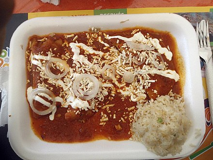 Enchiladas with salsa roja