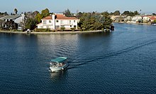 Boating is a popular activity in the city's lagoons. Foster City February 2013 002.jpg