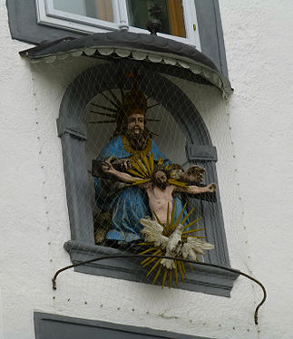 Detail of house n° 3. Recess with God and Christ.