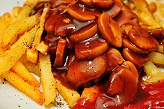 Mushroom gravy atop French fries French fries and mushroom gravy.jpg