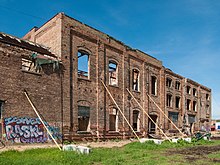 https://upload.wikimedia.org/wikipedia/commons/thumb/4/48/Garver_Feed_Mill_restoration-3.jpg/220px-Garver_Feed_Mill_restoration-3.jpg