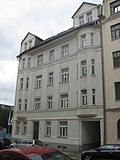 Tenement house in semi-open development;