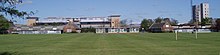 The former Gosforth West Middle School buildings are in the foreground, and the headquarters of the Northern Rock bank in the background. Gosforth West Middle.jpg