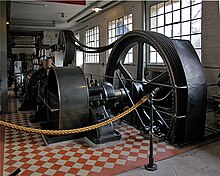 A preserved steam engine in Germany - one of the symbols of the industrial revolution, and a common topic of study for industrial archaeologists. HGG-IndustriemuseumLaufTandemdampfmaschine.JPG