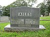 A polished grey headstone