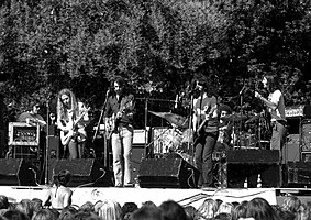 Kingfish performing in El Camino Park, Palo Alto, California, on June 8, 1975. Left to right: Barry Flast, Robbie Hoddinott, Bob Weir, Dave Torbert, Chris Herold, Matthew Kelly.