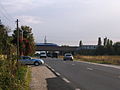 English: A TGV running over road D471, at the western corner of the "Triangle de Coubert", on LGV Interconnexion Est, in Seine-et-Marne, France. Français : Un TGV passe au-dessus de la D471, à l'extrémité ouest du "Triangle de Coubert" de la LGV Interconnexion Est, en Seine-et-Marne, France.