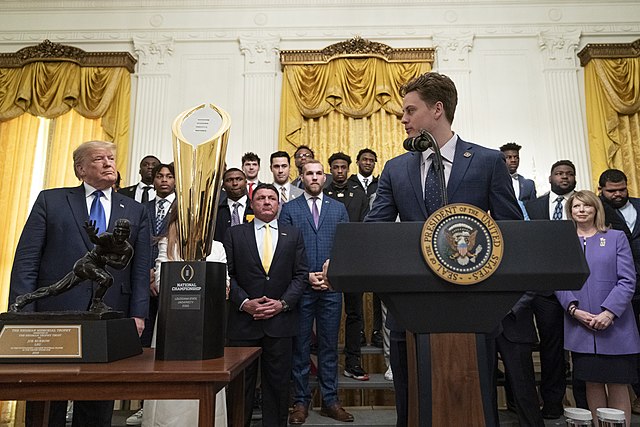 Members of the national champion 2019 LSU Tigers national championship team are hosted at the White House; quarterback Joe Burrow is shown speaking.