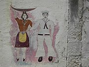 Lisboa Alfama - murale della donna e del marinaio