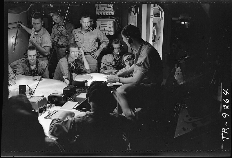 File:Lt. Cdr. A.F. Fleming, fighter director, in plot room of USS Lexington (CV-16) during a strike in the Gilbert & Marshall Islands - NARA - 520799.tif