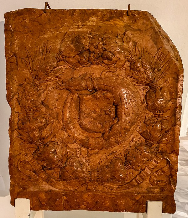 Red marble coat of arms of the family from 1484