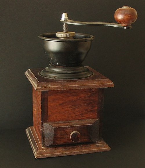 An old-fashioned manual burr-mill coffee grinder