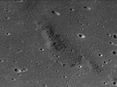 Oblique view of Mons Esam, facing south, at low sun angle, from Apollo 17 Mons Esam AS17-P-2295.jpg
