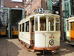 Elektrische motorwagen 164 uit de begintijd van de elektrische tram (1908) in het Haags Openbaar Vervoer Museum.