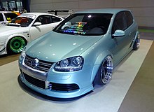 Stanced Volkswagen Golf Mk5 with a widebody kit at the 2016 Osaka Auto Messe. Osaka Auto Messe 2016 (395) - euromagic voomeran GOLF5 R32.jpg