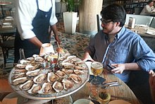 Oysters on the half shell, raw.jpg