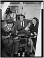 Portrait of Cliff Edwards, Betty Brewer, and Frank Raye, Ukelele Lady (yacht), Hudson River, N.Y., ca. June 1947 (LOC).jpg