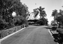 View of Government House along main drive, 1950 Queensland State Archives 1477 View of Government House along main drive 11 May 1950.png