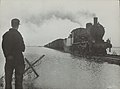 NS locomotive 3752 with freight train on the 'bathtub railway' through the Kruiningerpolder after the flood of 1953; 11 June 1953.