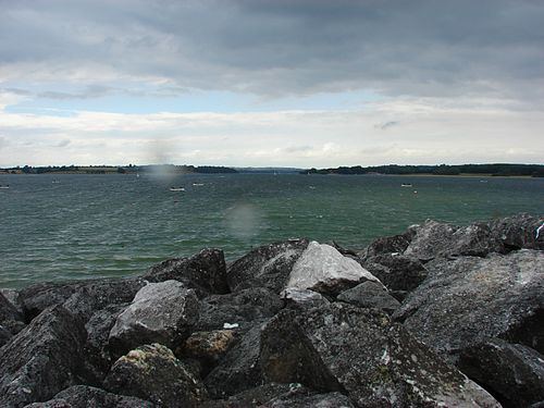 A blustery day and a nice view across the water from the dam of Rutland Water, the largest reservoir in England.