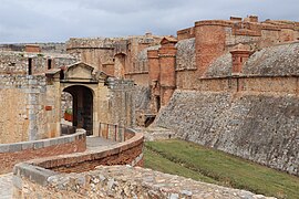 Sothern rampart and entrance to the Fort de Salses, Salses-le-Château, France.