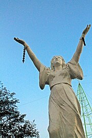 The Liberation Monument in the municipal park commemorating the Filipinos who fought against the Japanese forces in the Second World War San Jose Occ Mindoro WW2 monument.jpg