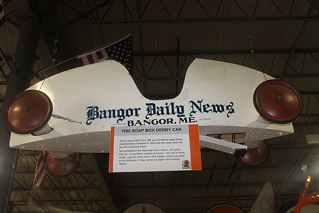 As part of its community relations, the Bangor Daily News in 1950 sponsored a soap box derby car, which bore the newspaper's logo. The car is on displ
