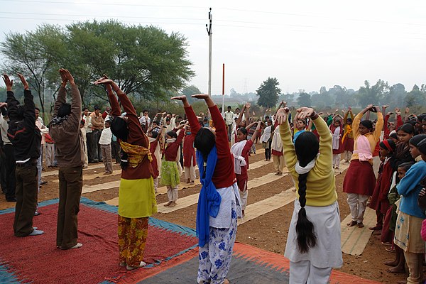 Sun Salutation at a public yoga event in Katni, India