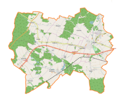 Mapa konturowa gminy Syców, blisko centrum na prawo znajduje się punkt z opisem „Dwór w Wielowsi”