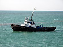 Guardacostas de Turkmeni en el puerto de ferry de Turkmenbashi (3891716183).jpg