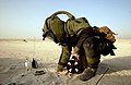 US Navy 050510-N-4309A-114 Hull Maintenance Technician 2nd Class Carl Harris inspects the remaining high explosive material from a disrupted improvised explosive device during a training exercise in Bahrain.jpg
